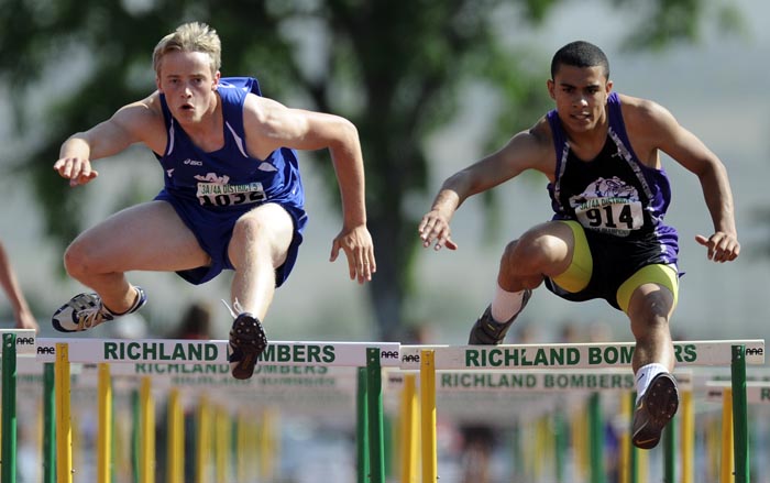 Action from the 3A/4A district track meet at Fran Rish Stadium at Richland High School on Friday afternoon.