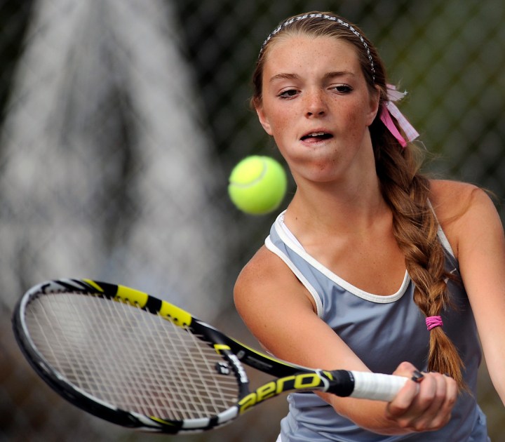 Mitchell's Sammy Pooley delivers a forehand shot while teaming up with Haley Smith in No. 1 doubles action during a dual against Brandon Valley on Tuesday afternoon at Hitchcock Park in Mitchell. (Matt Gade/Republic)