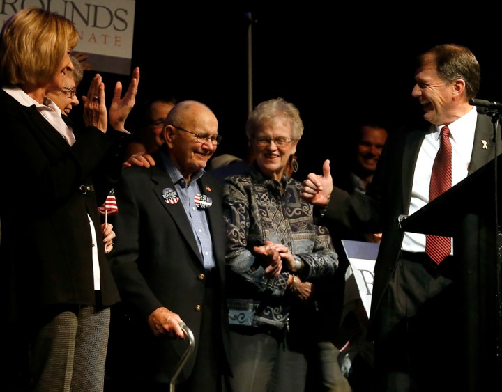 Mike Rounds gives his a thumbs up to his folks during his celebration speech during the Republican Election Party on Tuesday night at The District restaurant in Sioux Falls. (Matt Gade/Republic)