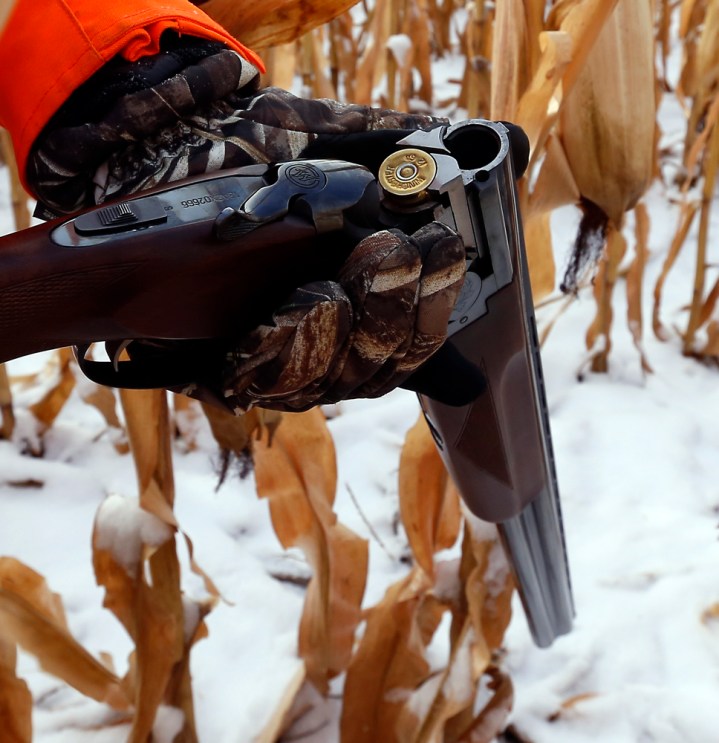 Terry Erwin loads his shotgun during a hunting trip at Firesteel Creek Hunting Lodge off HWY 281 on Tuesday morning near Plankinton. (Matt Gade/Republic)