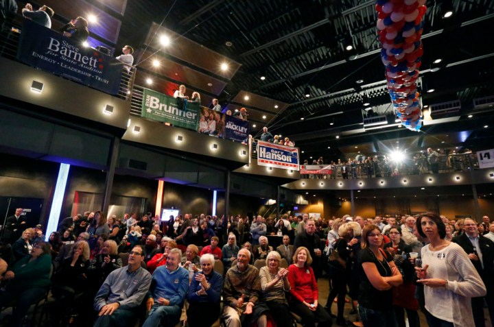 The crowd watches the big screen for the nationwide election results during the Republican Election Party on Tuesday night at The District restaurant in Sioux Falls. (Matt Gade/Republic)