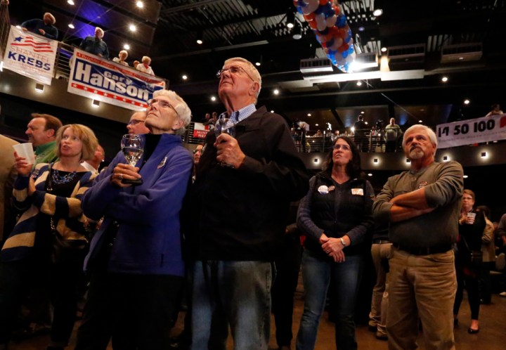 The crowd watches the big screen for the nationwide election results during the Republican Election Party on Tuesday night at The District restaurant in Sioux Falls. (Matt Gade/Republic)