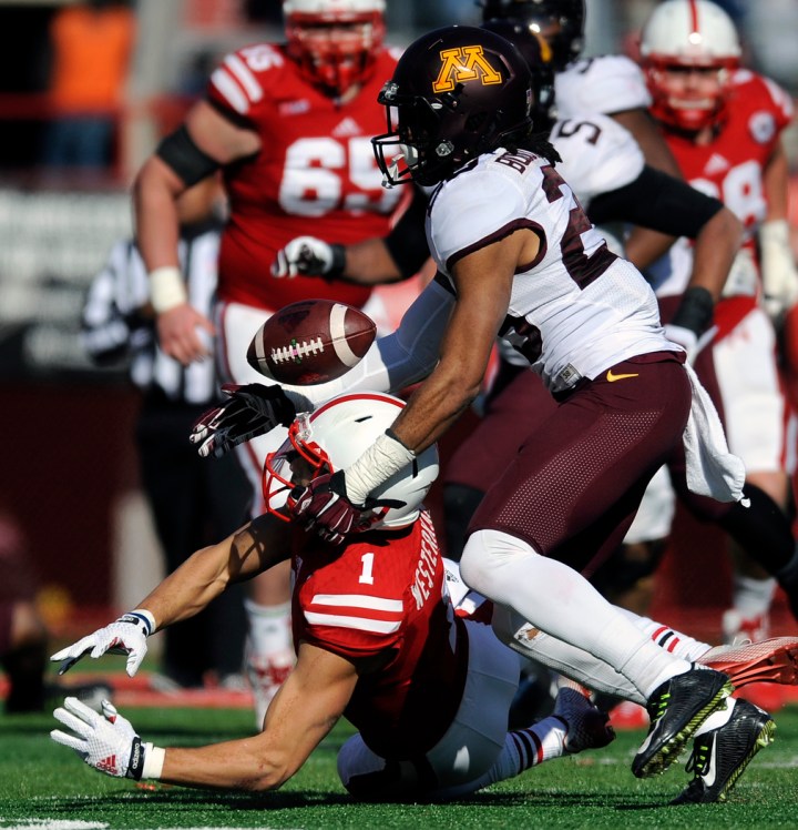 Nebraska Cornhuskers wide receiver Jordan Westerkamp (1) is unable to make the catch as he is tackled by Minnesota Golden Gophers defensive back Briean Boddy-Calhoun (29) during a game on Saturday, Nov. 22 in Lincoln, Neb. (© Matt Gade)