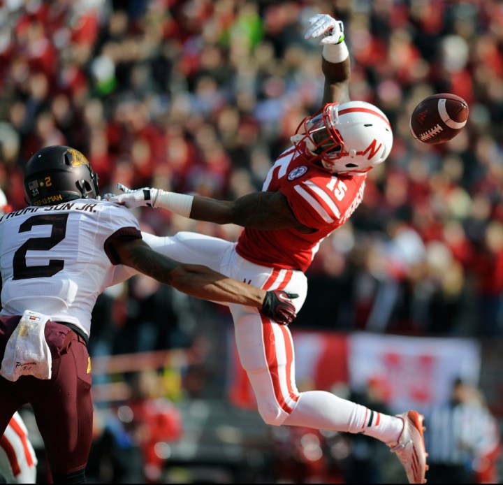 Nebraska Cornhuskers wide receiver De'Mornay Pierson-El (15) is unable to make a grab as Minnesota Golden Gophers defensive back Cedric Thompson (2) defends during a game on Saturday at Memorial Stadium in Lincoln. (© Matt Gade)