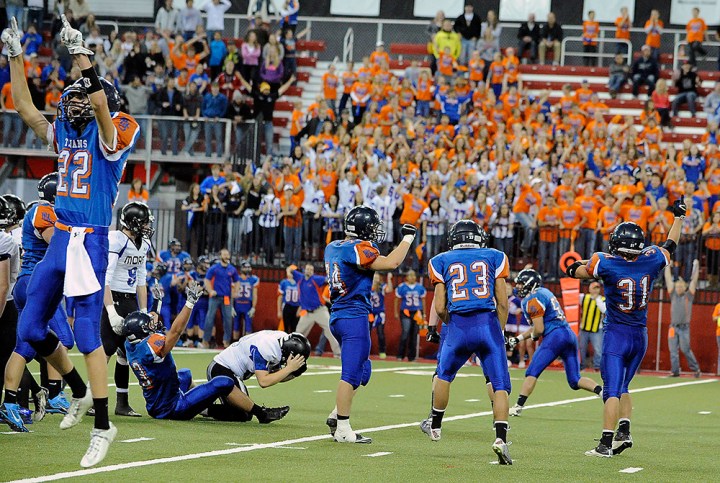 The Parkston Trojans celebrate a missed St. Thomas More Cavaliers field goal that would have tied the game instead gave the Trojans the win during the 11B state championship game on Friday at the DakotaDome in Vermillion. (Matt Gade/Republic)