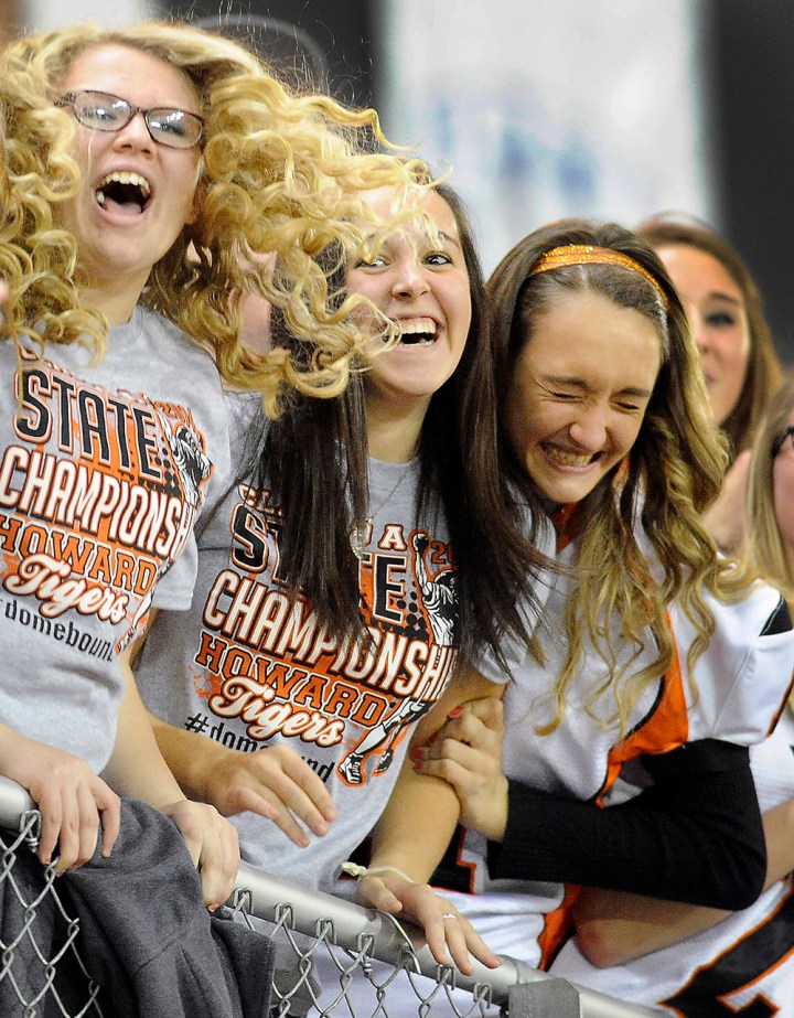 The Howard student section cheers after an interception by Howard's Gunner Gilbertson (14) in the fourth quarter during the 9A state championship game on Thursday at the DakotaDome in Vermillion..(Matt Gade/Republic)