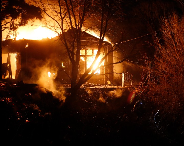 Firefighters with the Mitchell Fire Department, with assistance from Ethan, Mount Vernon, Alexandria and Rosedale battle a house fire early Sunday morning on Lakeview Lane in north Mitchell. (Matt Gade/Republic)