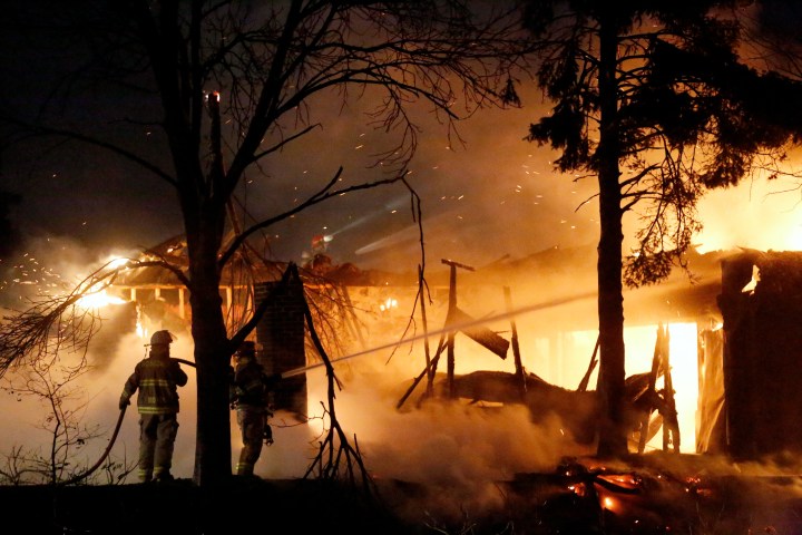Firefighters with the Mitchell Fire Department, with assistance from Ethan, Mount Vernon, Alexandria and Rosedale battle a house fire early Sunday morning on Lakeview Lane in north Mitchell. (Matt Gade/Republic)