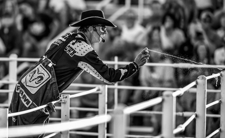 Rodeo clown Dennis Halstead sprays silly string into the audience on Thursday night during the first night of the 45th annual Corn Palace Stampede Rodeo at Horseman Arena in Mitchell.(Matt Gade/Republic)